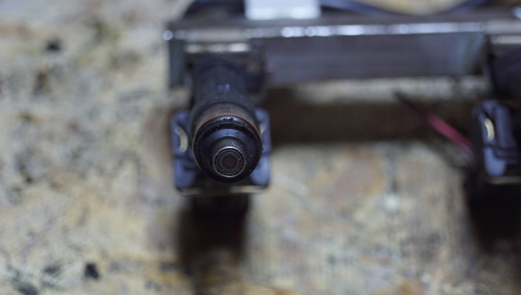 Купити Opel молдинг упорскування 1.2 1.4 55572731 w151