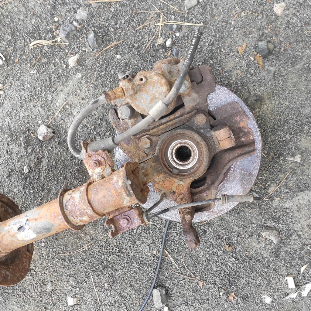 фото №4, Поворотный кулак амортизатор суппорт левый перед fiat punto 2004r 1.3jtd