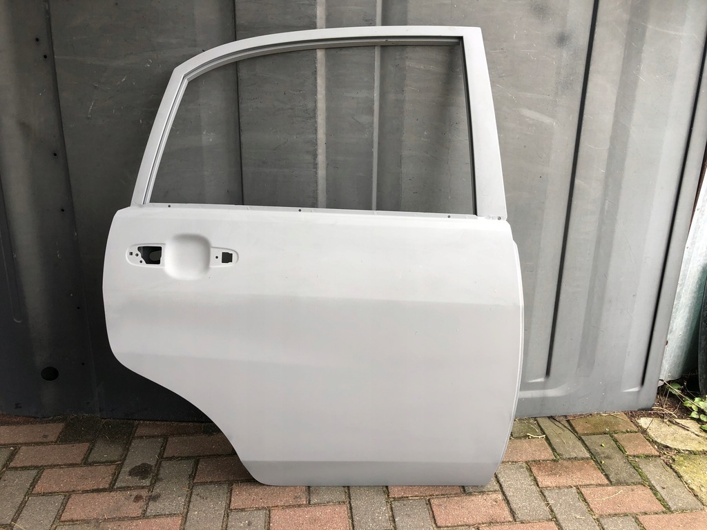 фото №1, Дверь suzuki liana sedan задняя правый