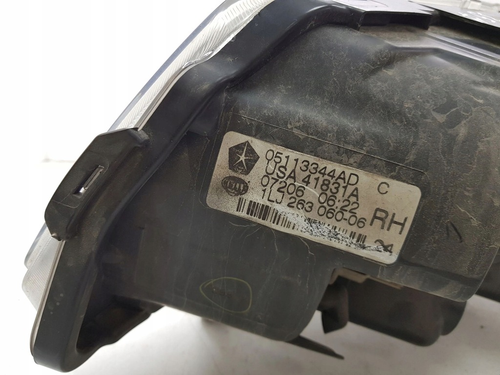 фото №7, Chrysler voyager 2008 правая сторона лампа передняя