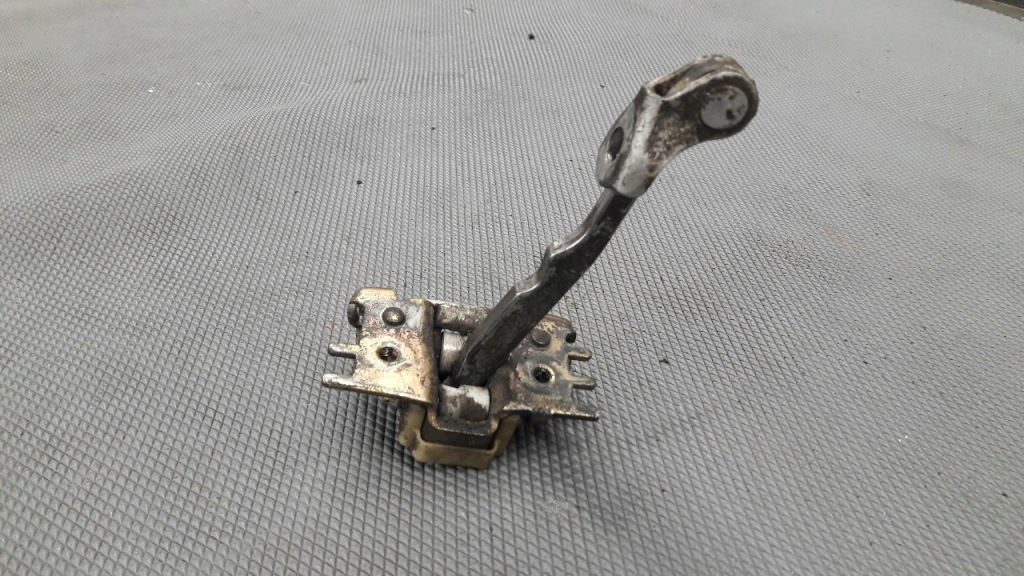 фото №1, Обмежувач двері лівий перед laguna ii