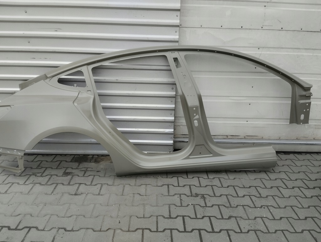 фото №1, Tesla 3 обшивка бічний праве nowe