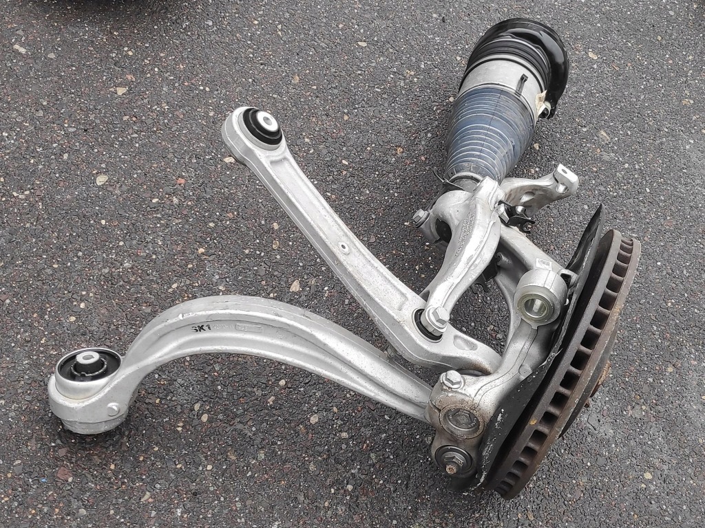 Поворотний кулак ступиця лівий перед ліва передня амортизатор touareg 3 4m0407559 Київ