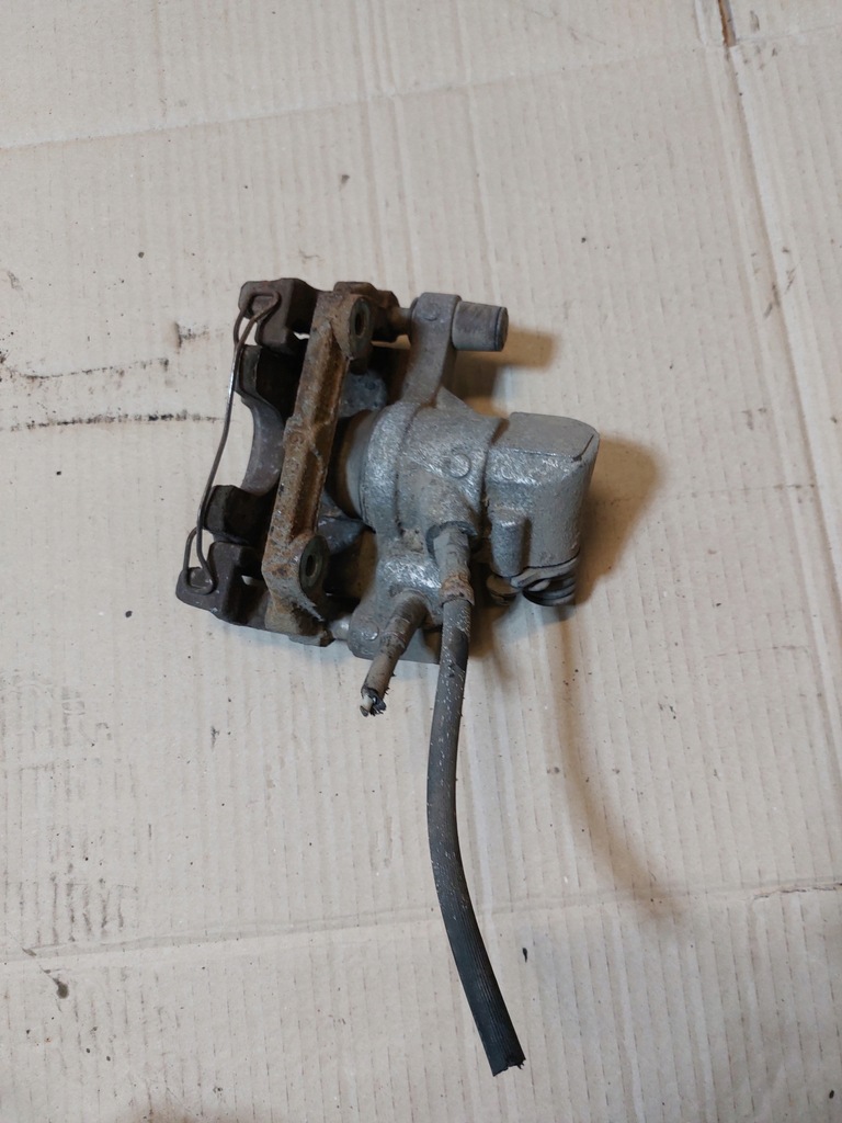 фото №11, Суппорт тормозной левый задняя mazda 5 05- 1.8b 16v