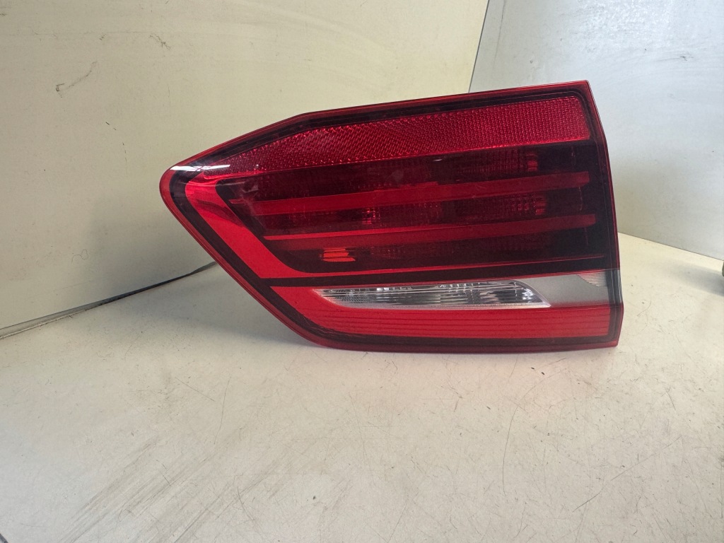 Купить Bmw f45 фара левое  задняя w крышке  7491341