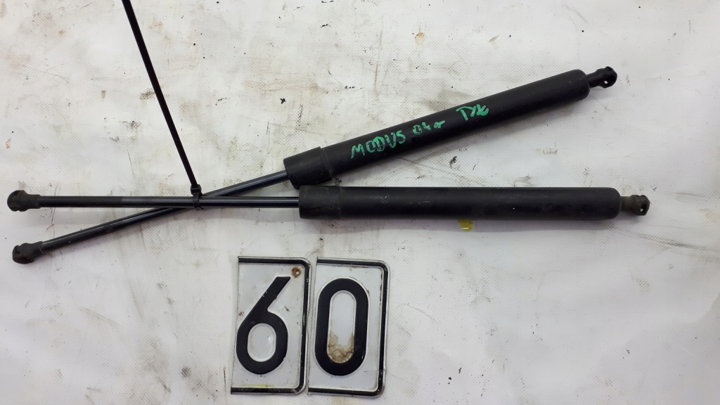 фото №1, Renault modus 1.6 16v амортизаторы крышки 8200219323