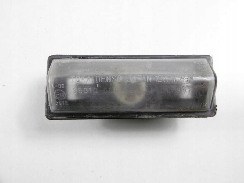 фото №7, Liana 01-04 лампа освещение номерного знака sedan 4d