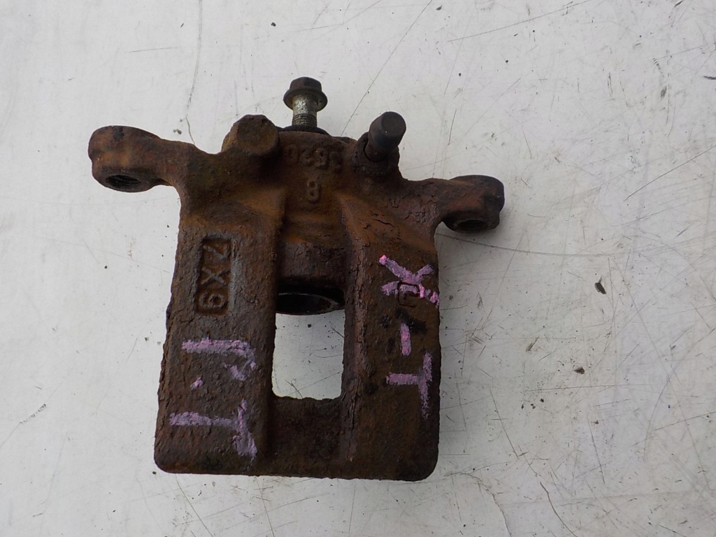 фото №1, Nissan x-trail t31 07-- супорт правий задня