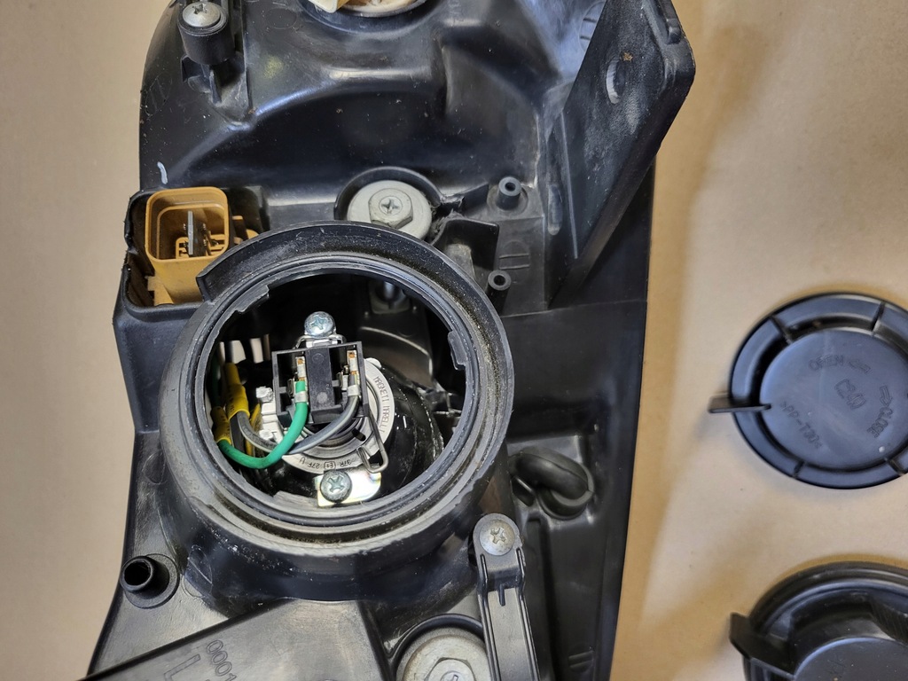 фото №15, Лампа фара левая перед chevrolet captiva i оригинальный номер europa