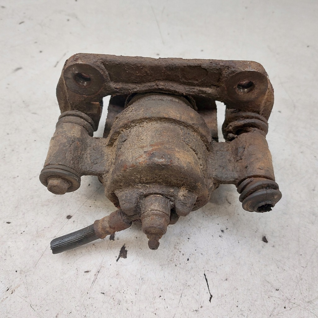 фото №11, Suzuki jimny суппорт тормозной левый перед