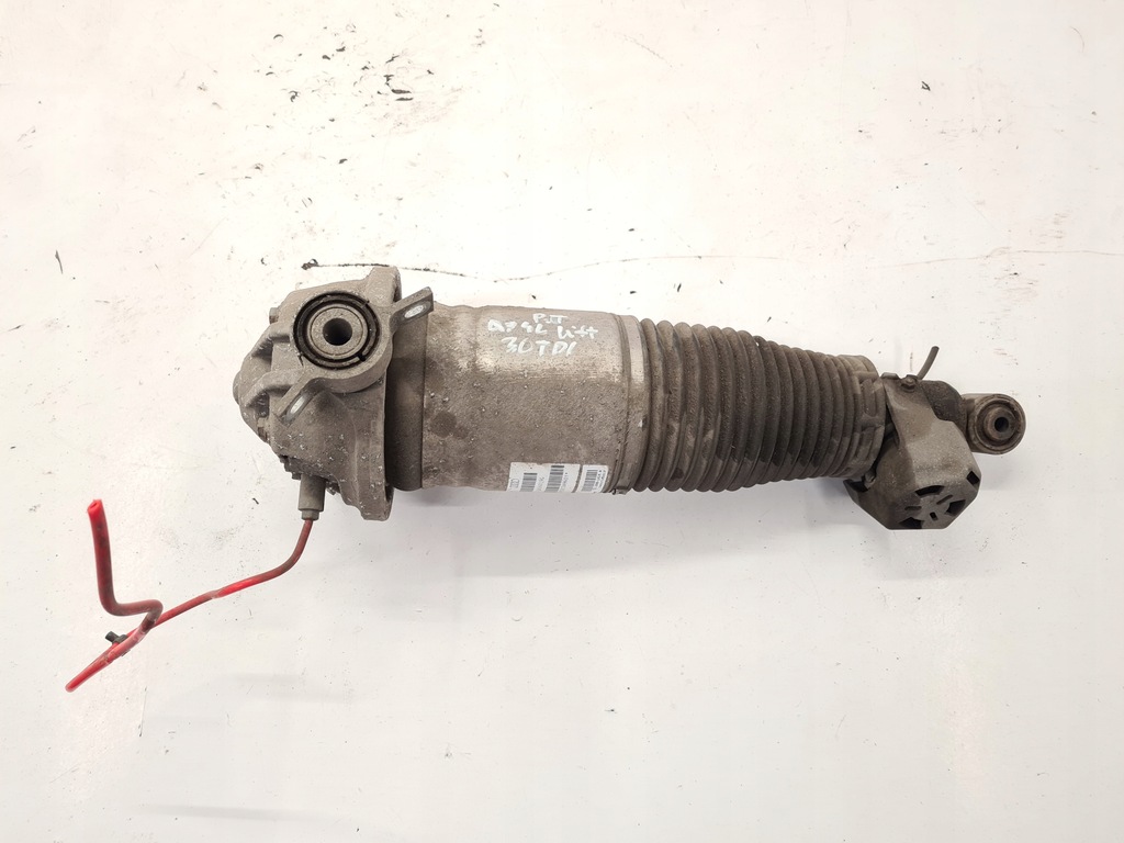 фото №1, Audi q7 4l амортизатор пневматический левый задняя