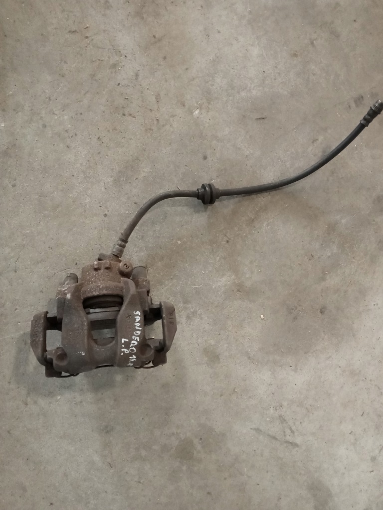 фото №1, Sandero stepway 12-20 суппорт тормоза левый перед