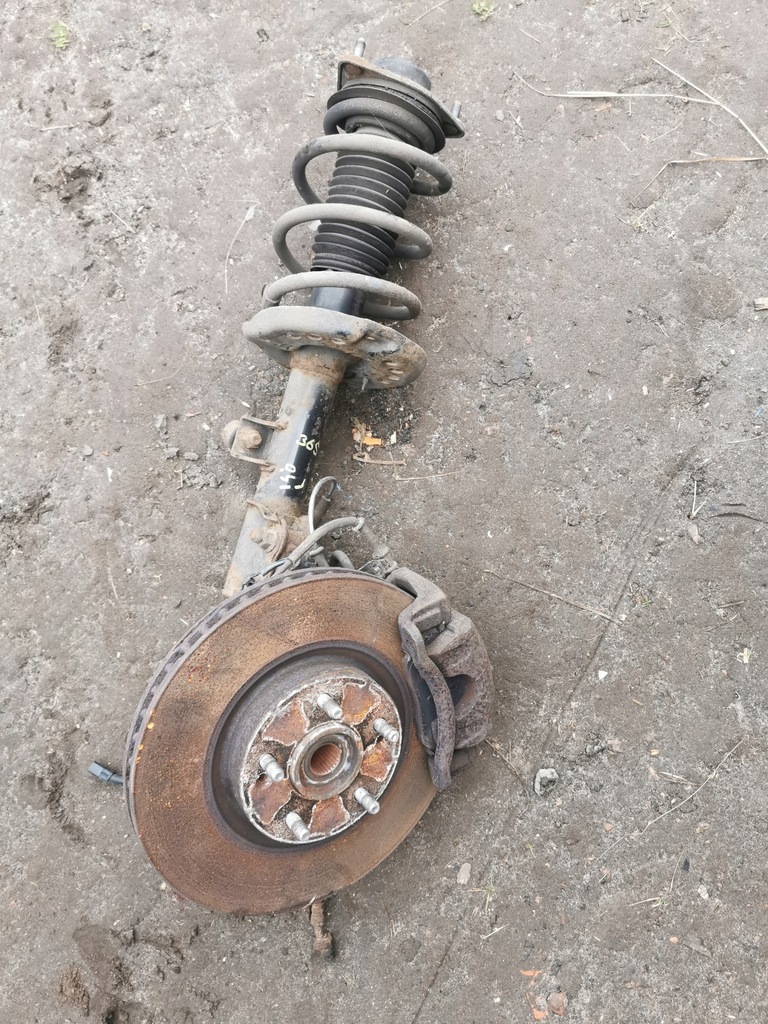 фото №1, Hyundai i40 амортизационная стойка amrtyzator поворотный кулак левый