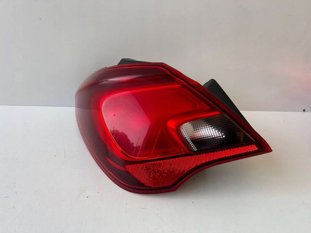 фото №1, Opel corsa e лампа ліва задня 39068622 оригінал