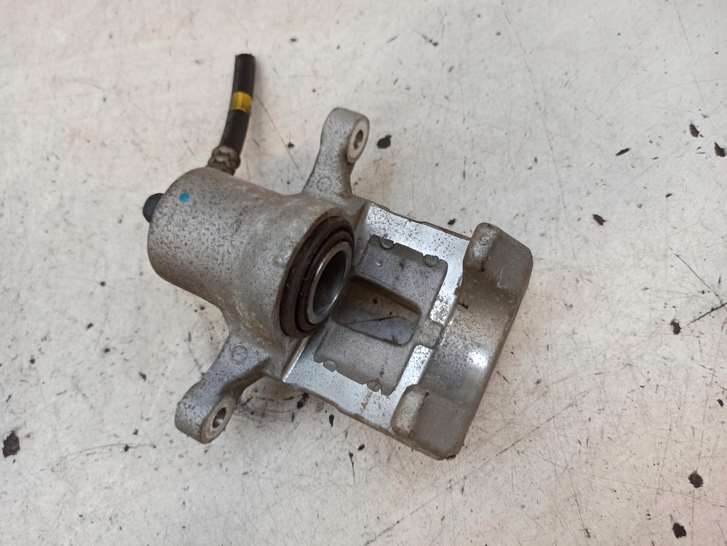 фото №9, Hyundai ix35 супорт гальмівний правий задня 582102y300