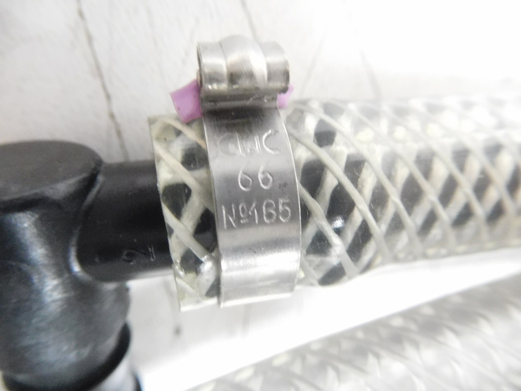 фото №12, Клапан распылителя фары перед fiat punto оригинальный номер 7773597