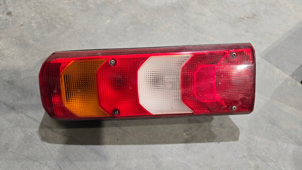 фото №1, Atego mp3 3 лампа задняя задняя задняя левая ze свет pod номерной знак 0035446803