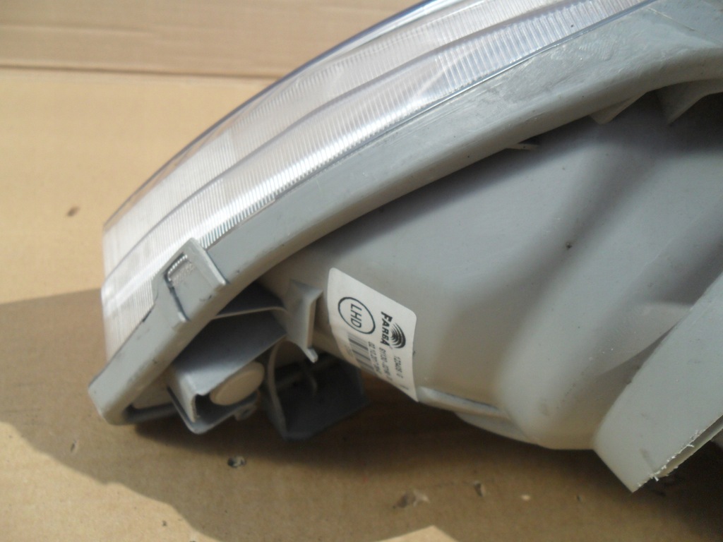 фото №9, Toyota corolla sedan 2002- лампа права передня