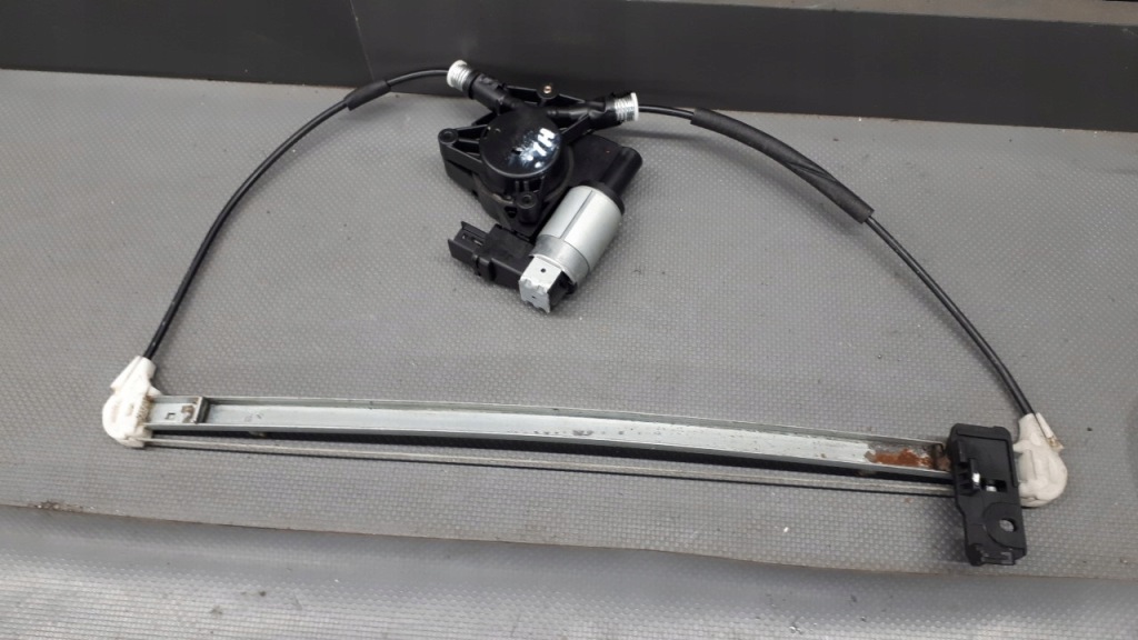 фото №1, Механізм скло лівий задня mazda 5 6 pin