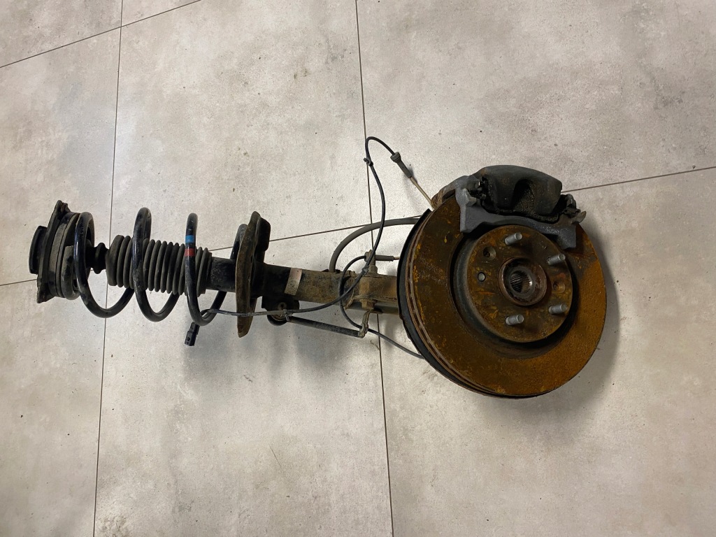 фото №1, Nissan leaf i поворотный кулак амортизационная стойка правый перед