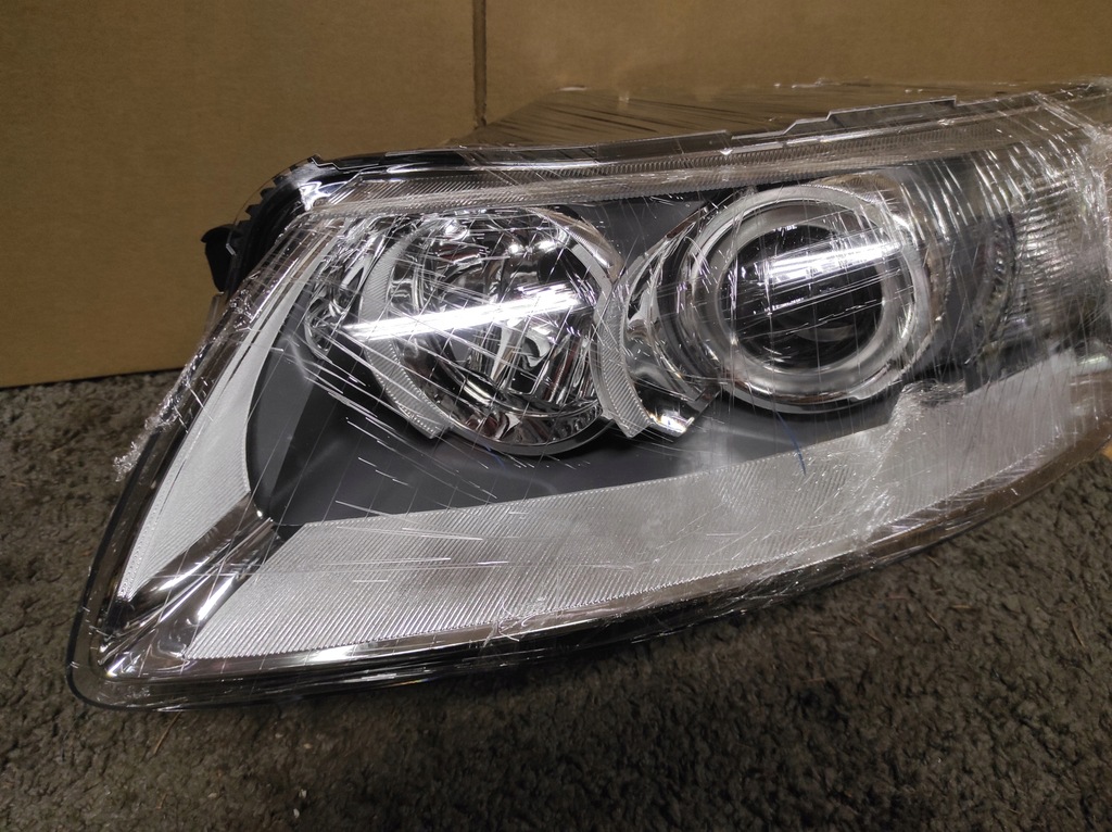 фото №14, Bi ксенон bi-xenon ліва лампа ze світло do рух jedziennej a6 c6 audi