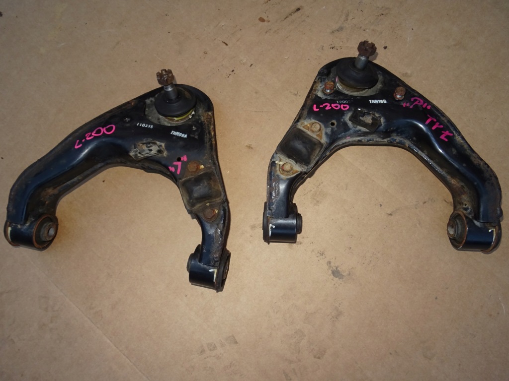 фото №1, Mitsubishi l200 рычаг левый верхний перед