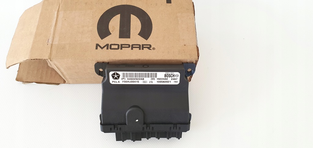 фото №1, Модуль двері mopar 04602922ab оригінальний номер новий