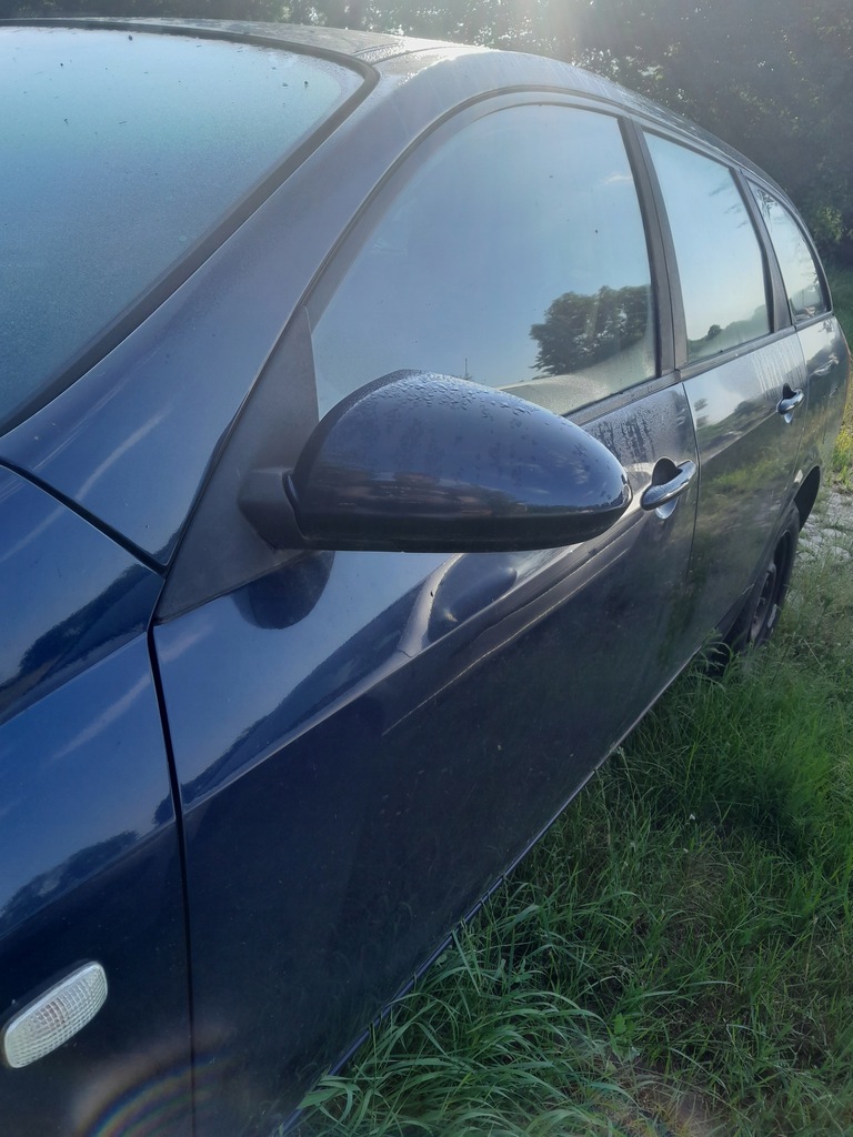 фото №1, Nissan primera p12 ліва дзеркало