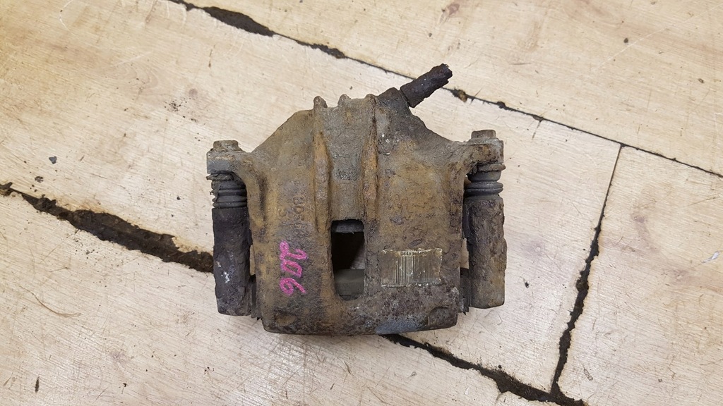 фото №1, Суппорт тормозной перед левый peugeot 206 cc