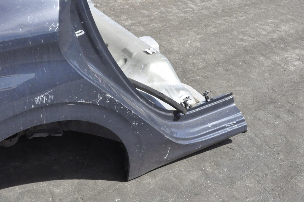 Peugeot 208 1 dup.a ремень поддон крыло задний  полный Цена