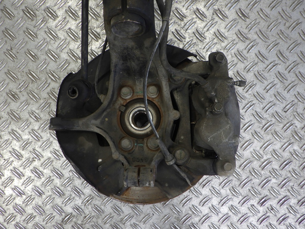 фото №6, Амортизационная стойка поворотный кулак левый перед koleos ii