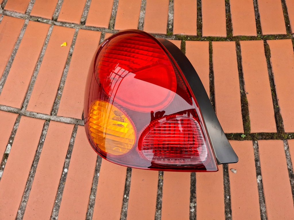 фото №1, Toyota corolla e11 97-02 лампа задня задня ліва хетчбек 5-двері