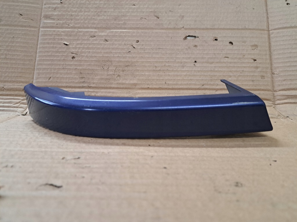 фото №1, Mazda 323 молдинг накладка на фару pod фара левый перед