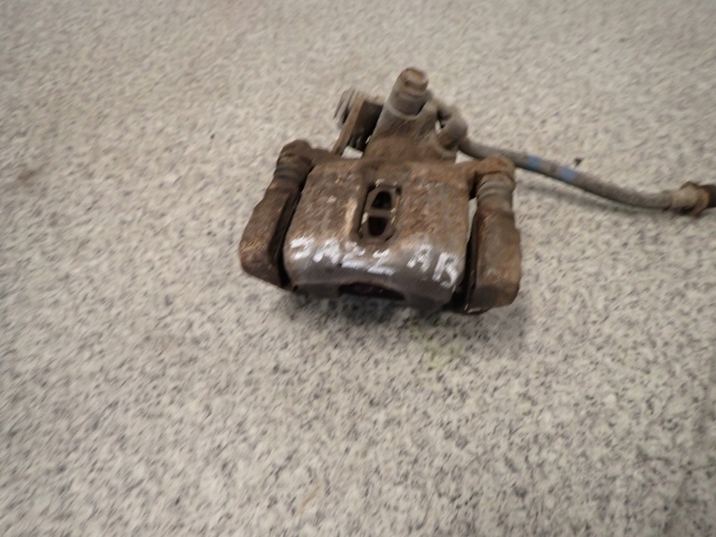 фото №1, Honda jazz 02-08 супорт задній правий задня