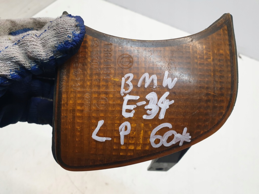 Поворотник левое  bmw e34 Оригинал