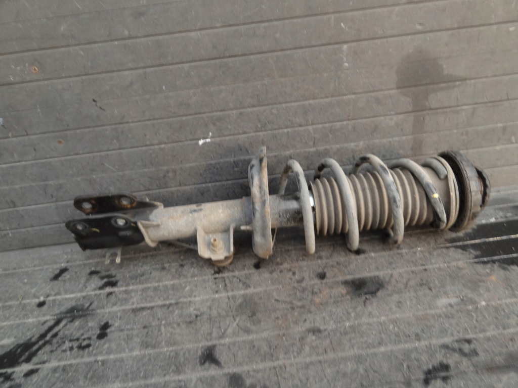 Купити Opel karl 2016 1,0 амортизатор передній лівий оригінал