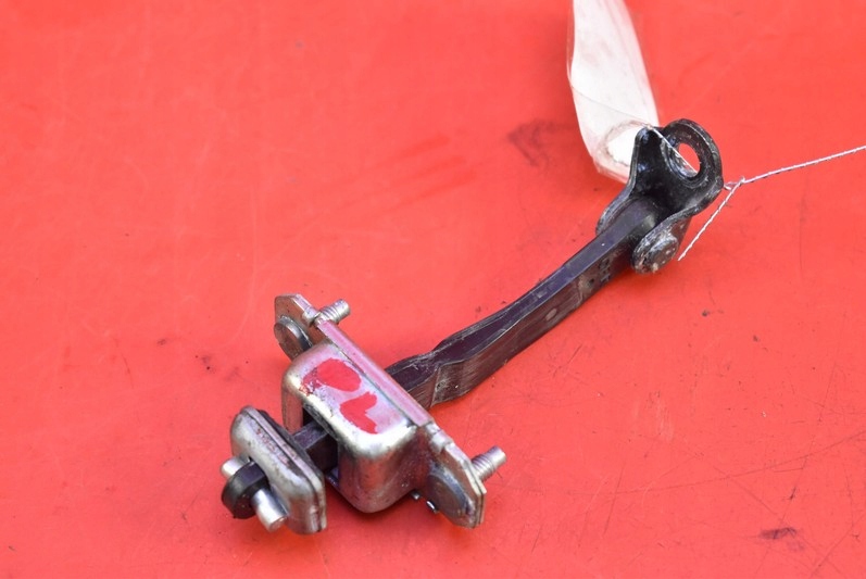 фото №1, Обмежувач двері лівий перед subaru legacy iv 06r