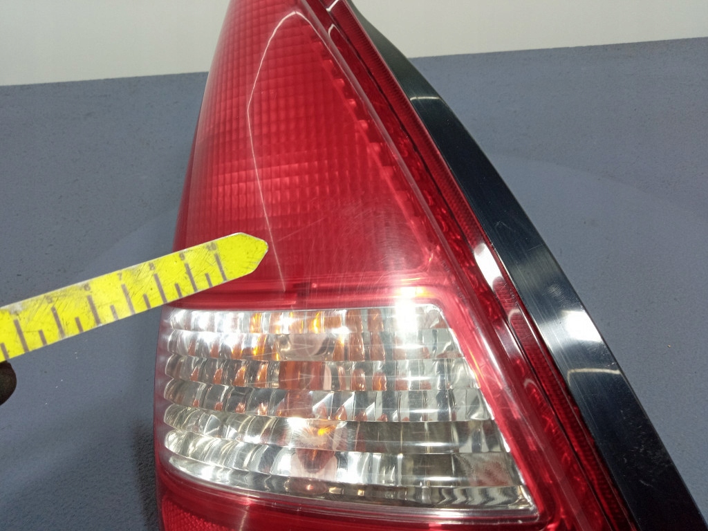 фото №6, Suzuki liana hb 01- лампа задняя левая задняя stanley p0925