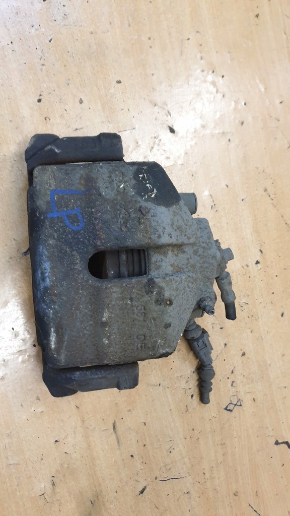 фото №1, Audi a3 8p суппорт тормозной левый перед 2.0 tdi