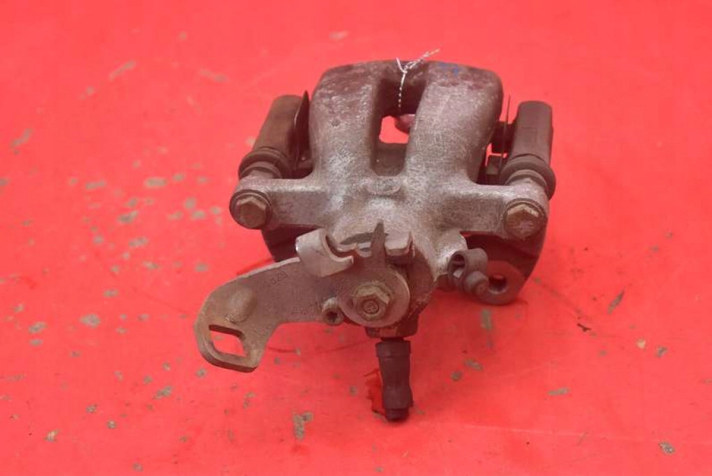 фото №5, Супорт гальмівний лівий задня mini cooper one r56 1.6 t 184 km 10-14