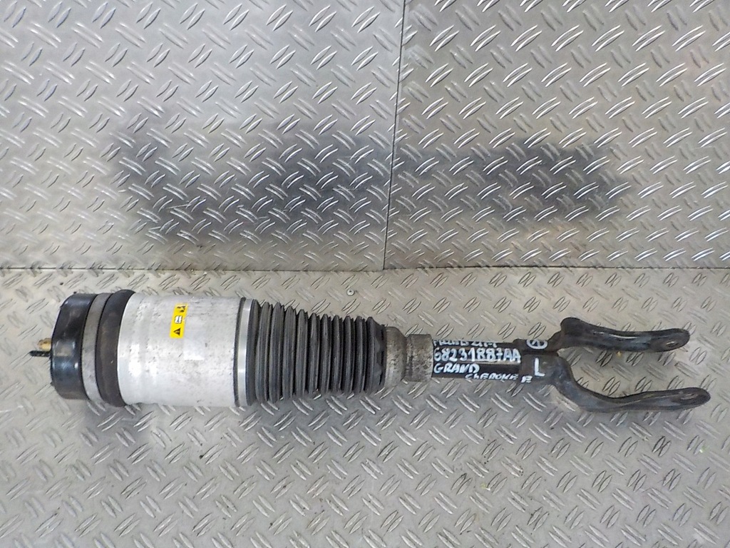 фото №1, Jeep grand cherokee wk2 амортизатор перед левый