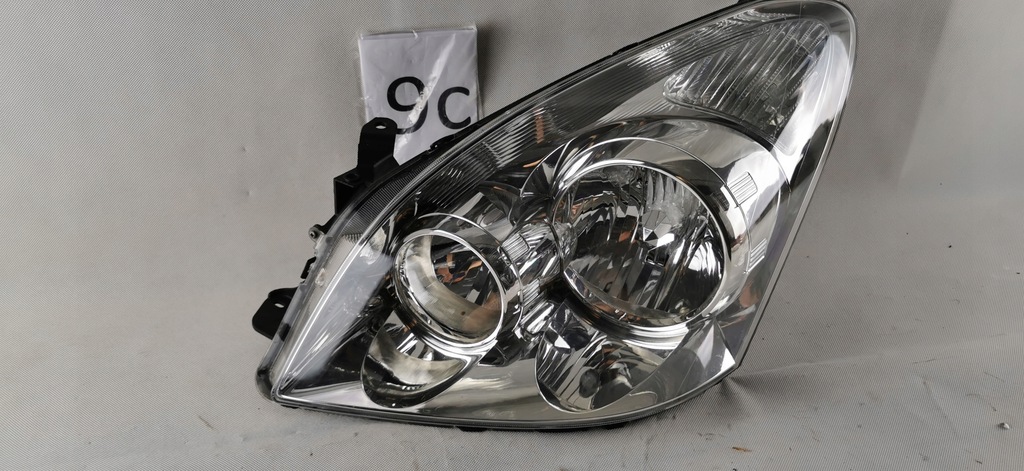 фото №1, Toyota corolla verso ii lift фара левый лампа