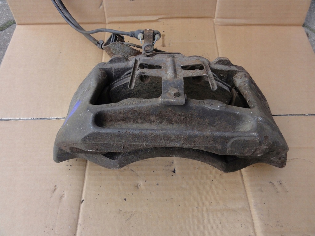 фото №1, Суппорт тормозной левый передний mercedes 609 711 vario