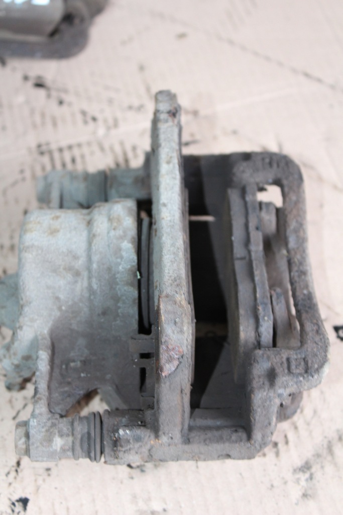 фото №6, Corolla e11 2.0 d4d 1cd супорт гальма скоба лівий перед