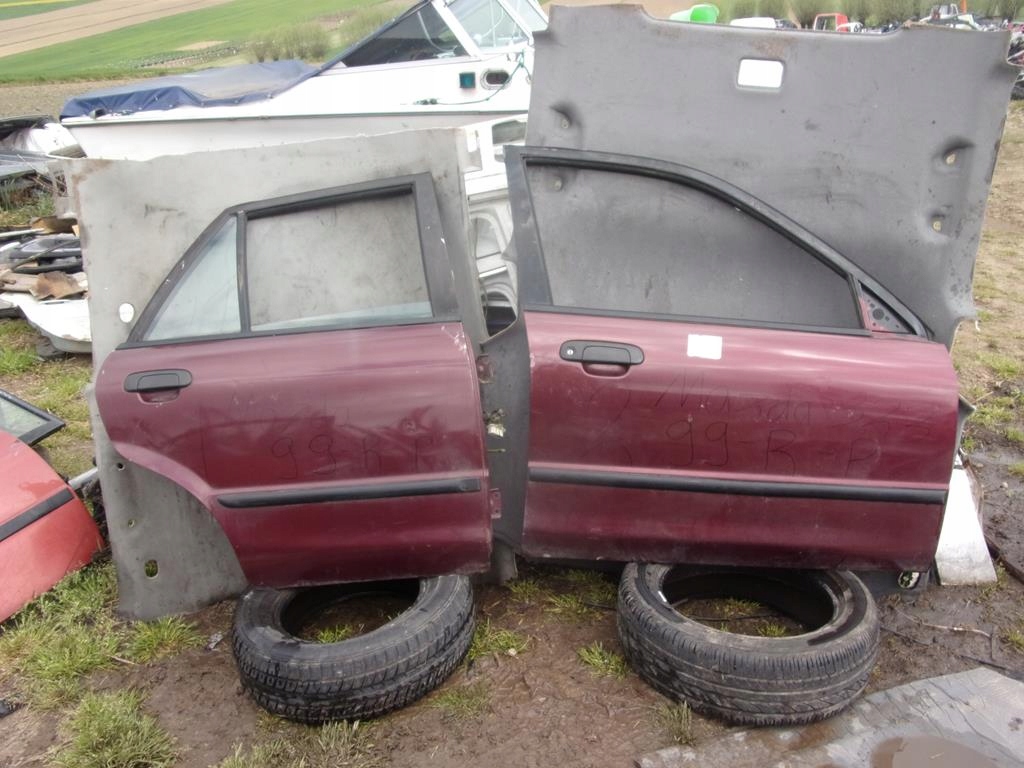 фото №2, Дверь mazda 323 bj