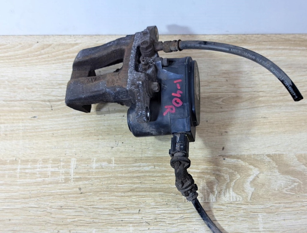 фото №1, I40 kombi 1.7 crdi суппорт тормозной правый задняя