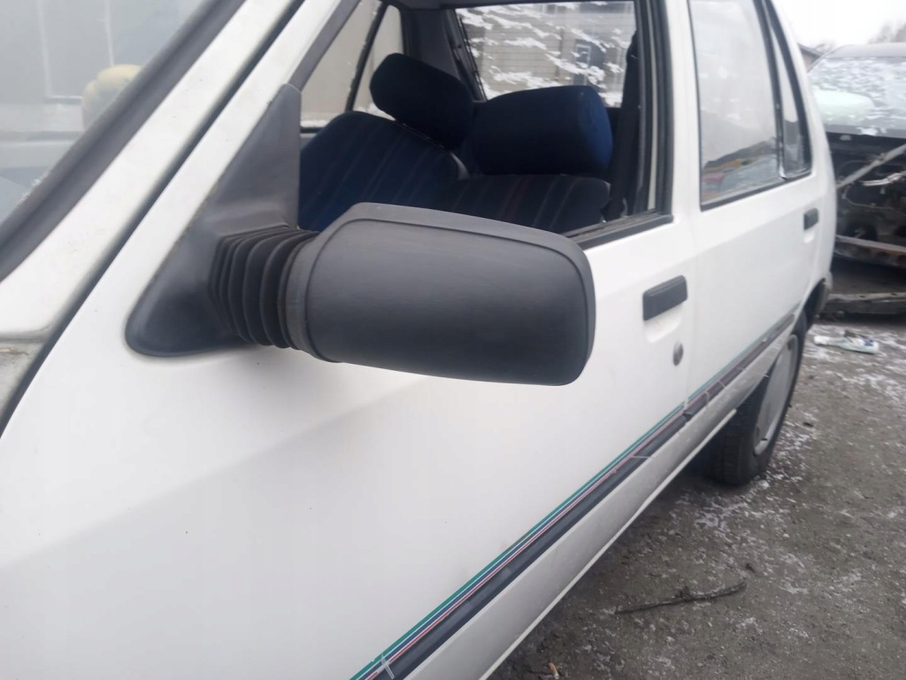 Купити Peugeot 205 83- дзеркало ліва