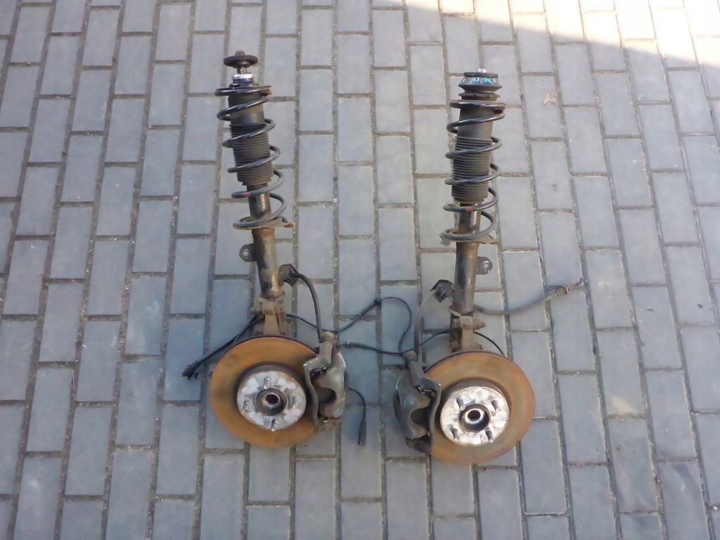 фото №1, Амортизаторна стійка поворотний кулак лівий nissan note e12 13 1.5 dc