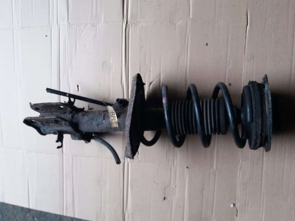 фото №1, Nissan pulsar амортизатор перед