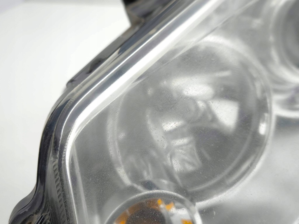 фото №12, Chrysler grand voyager v 2009 ліва сторона лампа передня